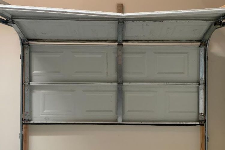 Bent Garage Door Panel Repair